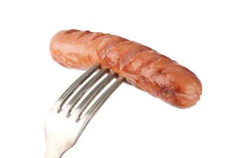 Grilled sausage on a fork Stock Photos