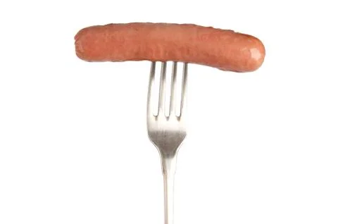 Grilled sausage on a fork Stock Photos