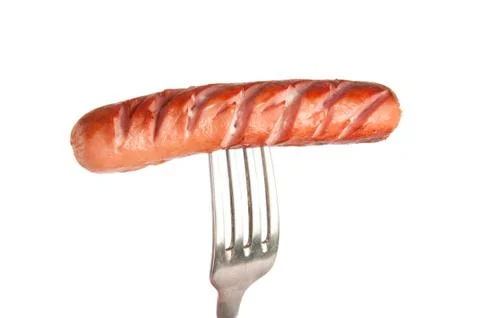 Grilled sausage on a fork Stock Photos