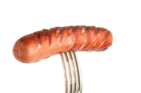 Grilled sausage on a fork Stock Photos