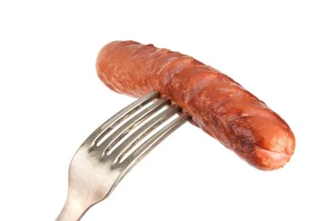 Grilled sausage on a fork Stock Photos