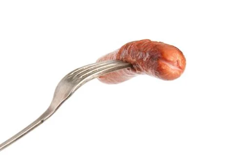 Grilled sausage on a fork Stock Photos