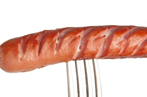 Grilled sausage on a fork Stock Photos