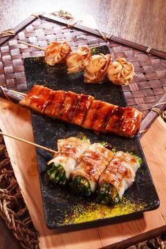 Grilled scallop eel vegetable meat roll Stock Photos