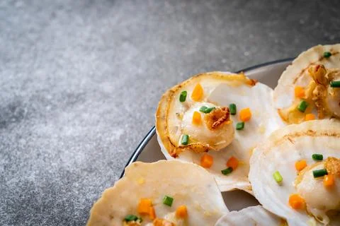 Grilled scallops shell with butter Stock Photos