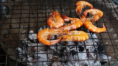 Grilled  seafood on fire Stock Footage 79670599