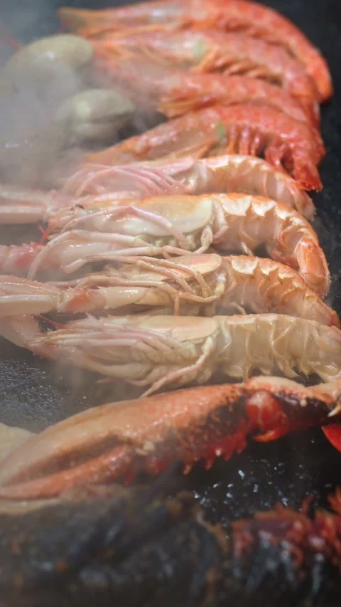 Grilled seafood in a restaurant Video stock 296332458