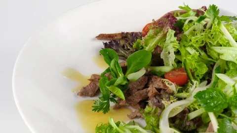 Grilled sliced Beef salad with mix of vegetables Stock Footage 78187633