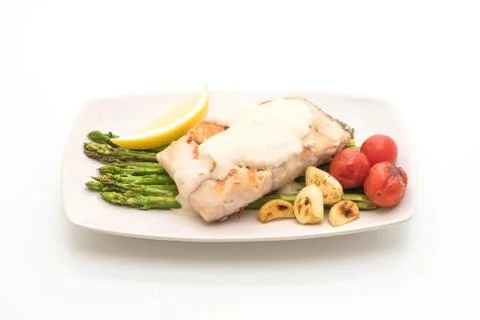 Grilled snapper fish steak with vegetable 스톡 사진