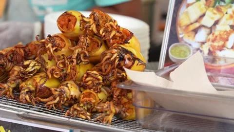 Grilled squid egg (khai pla muk tod) 動画素材 249677123