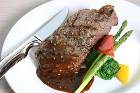 Grilled steak Stock Photos