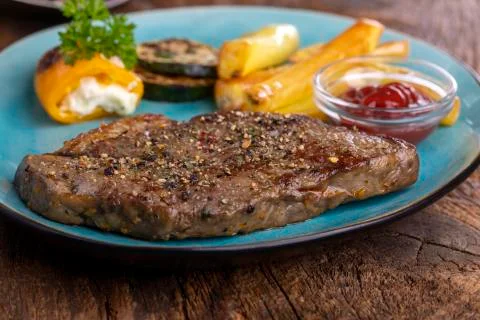 Grilled steak Stock Photos
