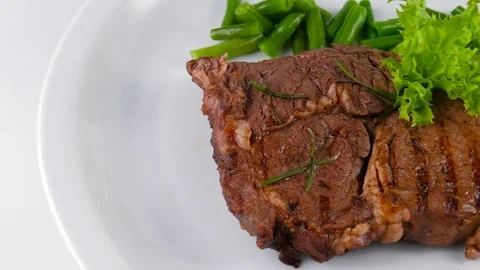 Grilled Steak plate served in Restaurant, copy space on left side Stock Footage 79714527