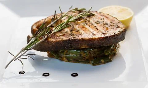 Grilled steaks of fresh fish Stock Photos