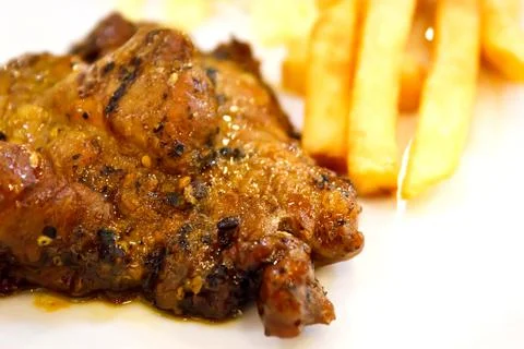 Grilled steaks Stock Photos