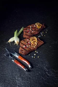 Grilled steaks Stock Photos