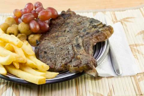 Grilled t-bone steak Photos