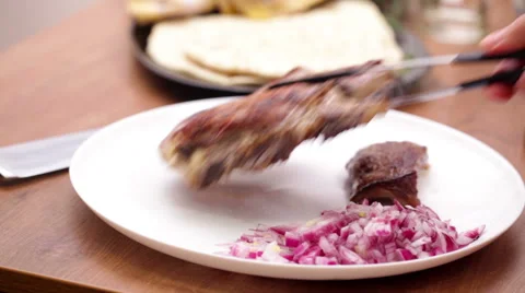 Grilled  T-bone steak placed on plate Stock Footage 44632959
