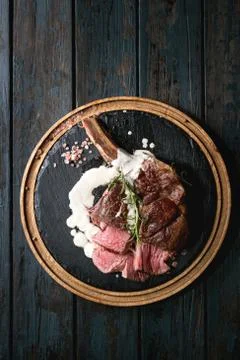 Grilled tomahawk steak Stock Photos