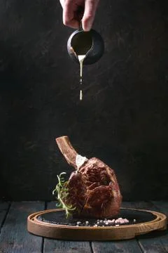 Grilled tomahawk steak Stock Photos