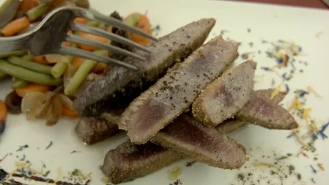 Grilled tuna with vegetables garnish Stock Footage