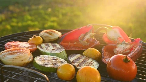 Grilled vegetables on background of green grass Stock Footage 139869132