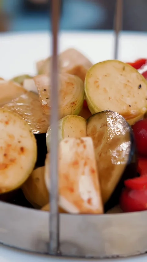 Grilled vegetables. cooking. close-up. chopped vegetables in spices for baking Stock-Footage 317936995