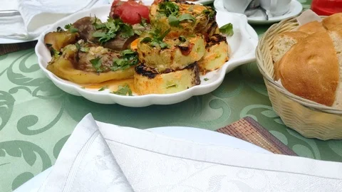 Grilled vegetables on a dish on a table in a restaurant Stock Footage 110922178