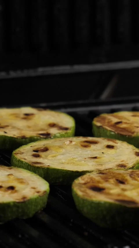Grilled vegetables. Healthy food. Cooking zucchini on an electric grill Stock Footage 314911953