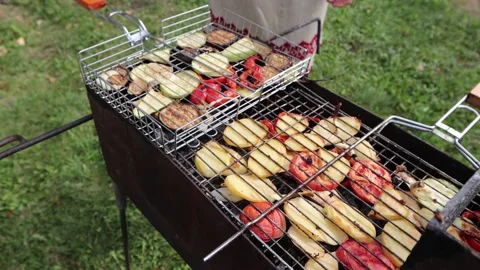 Grilled vegetables in nature. Видео 144441088