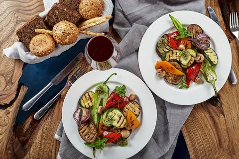 Grilled vegetables on a white plates. restaurant Stock Photos