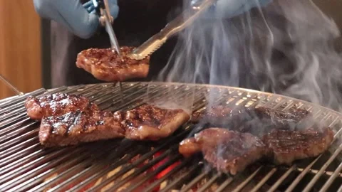 Grilled Wagyu Steak on Charcoal at Korean BBQ Stock Footage 225674553
