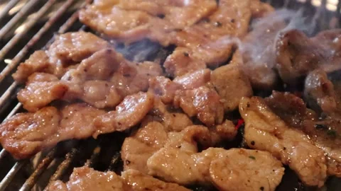 Grilled Wagyu Steak on Charcoal at Korean BBQ Stock Footage 225685204