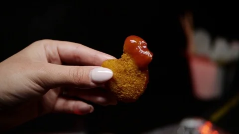 Grilled wings in the foreground. Selective focus on delicious chicken meat baked Stock Footage 127541726