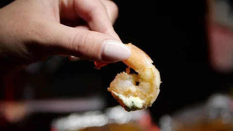 Grilled wings in the foreground. Selective focus on delicious chicken meat baked Stock Footage 127541730