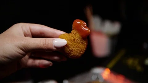 Grilled wings in the foreground. Selective focus on delicious chicken meat baked Stock Footage 127541732