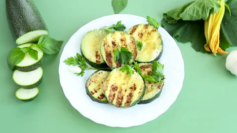Grilled zucchini in a plate top view Stock Footage 314417228