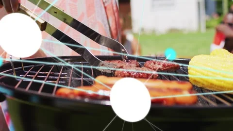 Griller using tongs lifting and flipping burger at barbecue, animated dots Stock Footage 333704363