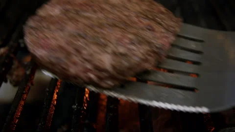 Grilling And Flipping A Burger With Flames Stock Footage 243618130