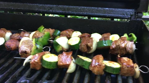 Grilling beef kabobs Stock Footage 67019879