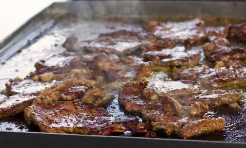 Grilling beef meat. Smoke. Foto stock