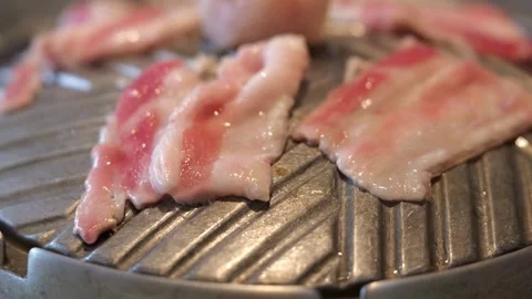 Grilling Beef on Thai BBQ Hot Pot Stock Footage 344399421