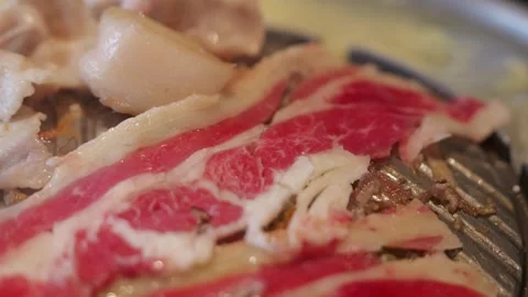 Grilling Beef on Thai BBQ Hot Pot Stock Footage 344399461