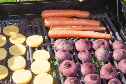 Grilling beetroots Stock Photos