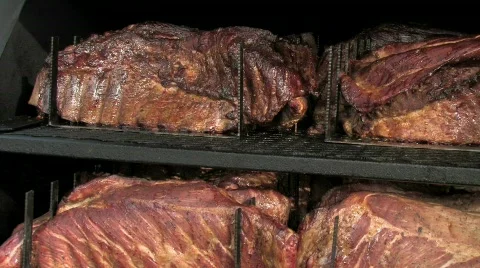 Grilling Boston Butt roasts on a barbecue Stock Footage