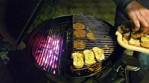 Grilling bread slices with butter and spices and pumpkin steaks Stock Footage 298024196