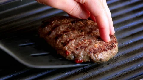 Grilling the burger. Stock Footage 208688025