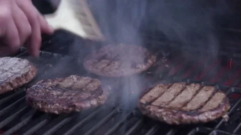 Grilling Burgers Stock Footage 74862837