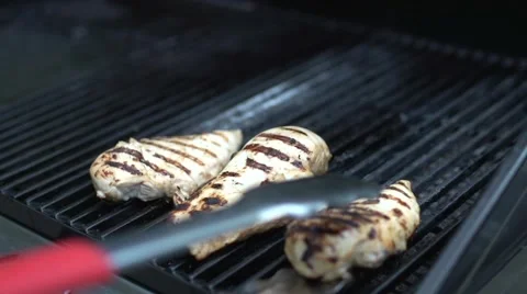 Grilling chicken (2 of 4) Stock Footage 39971912
