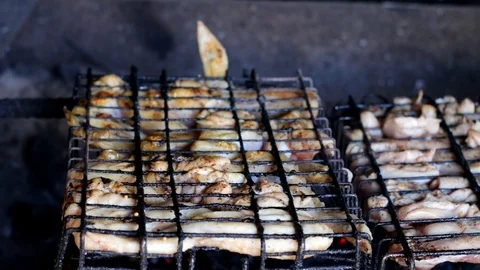 Grilling Chicken on BBQ. Chicken on the grill. Chicken meat cooking on bbq grill Stock Footage 89955979